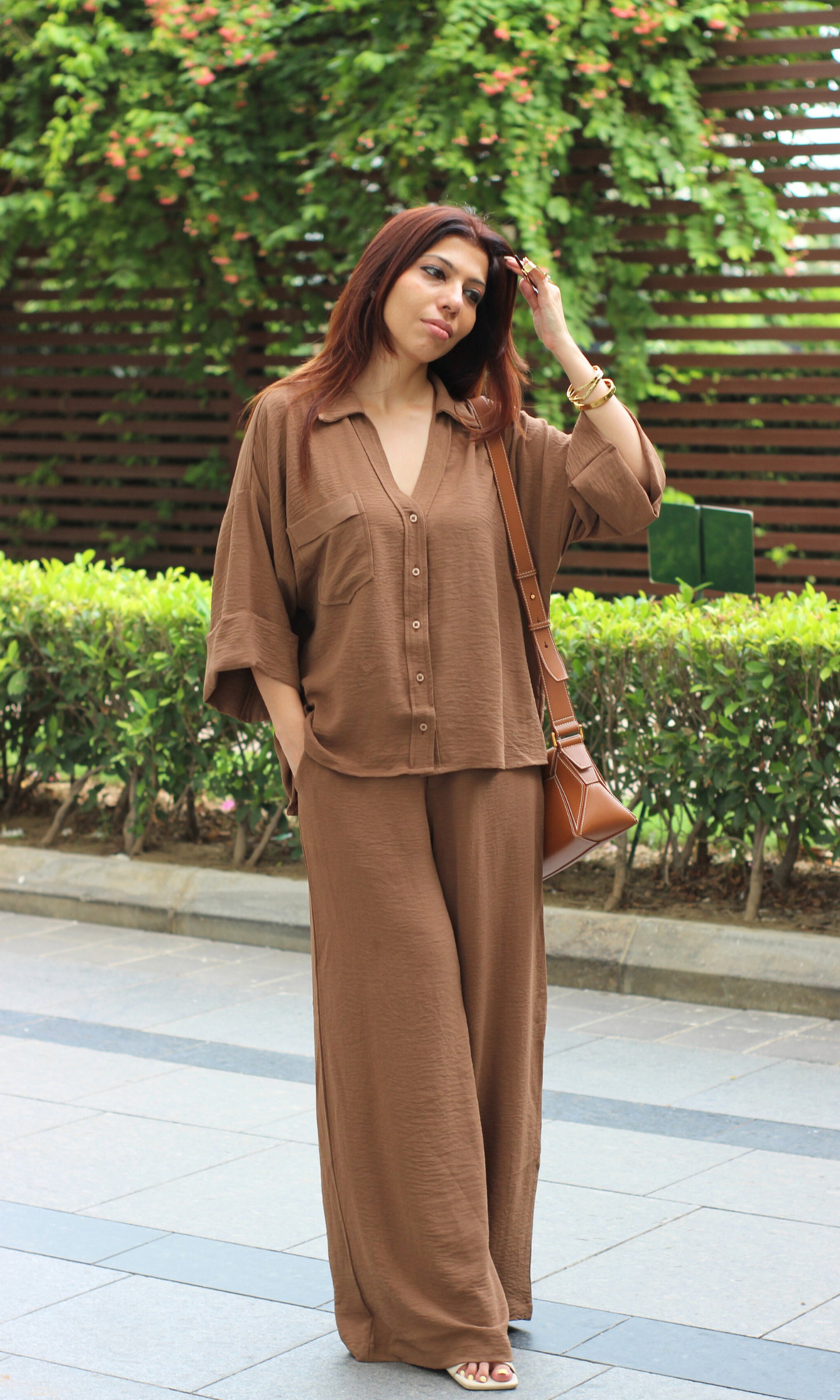 Minimalist beige-toned Soft Mocha Loose Shirt and Pants Co-ord styled with rolled sleeves and flowy high-waisted pants.