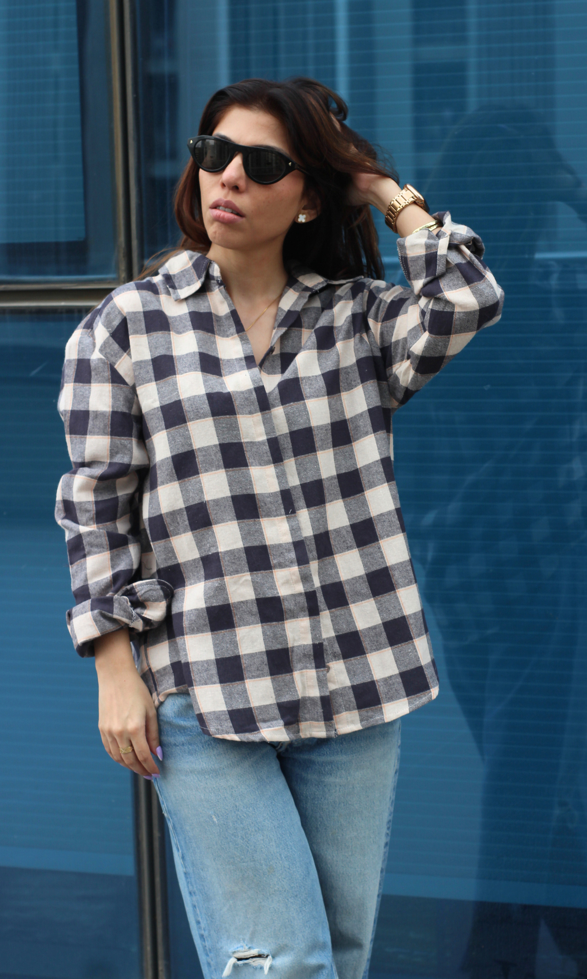 Model wearing the Blue Classic Buffalo Check Shirt featuring oversized checks and fine stripes in a cozy, breathable cotton fabric.