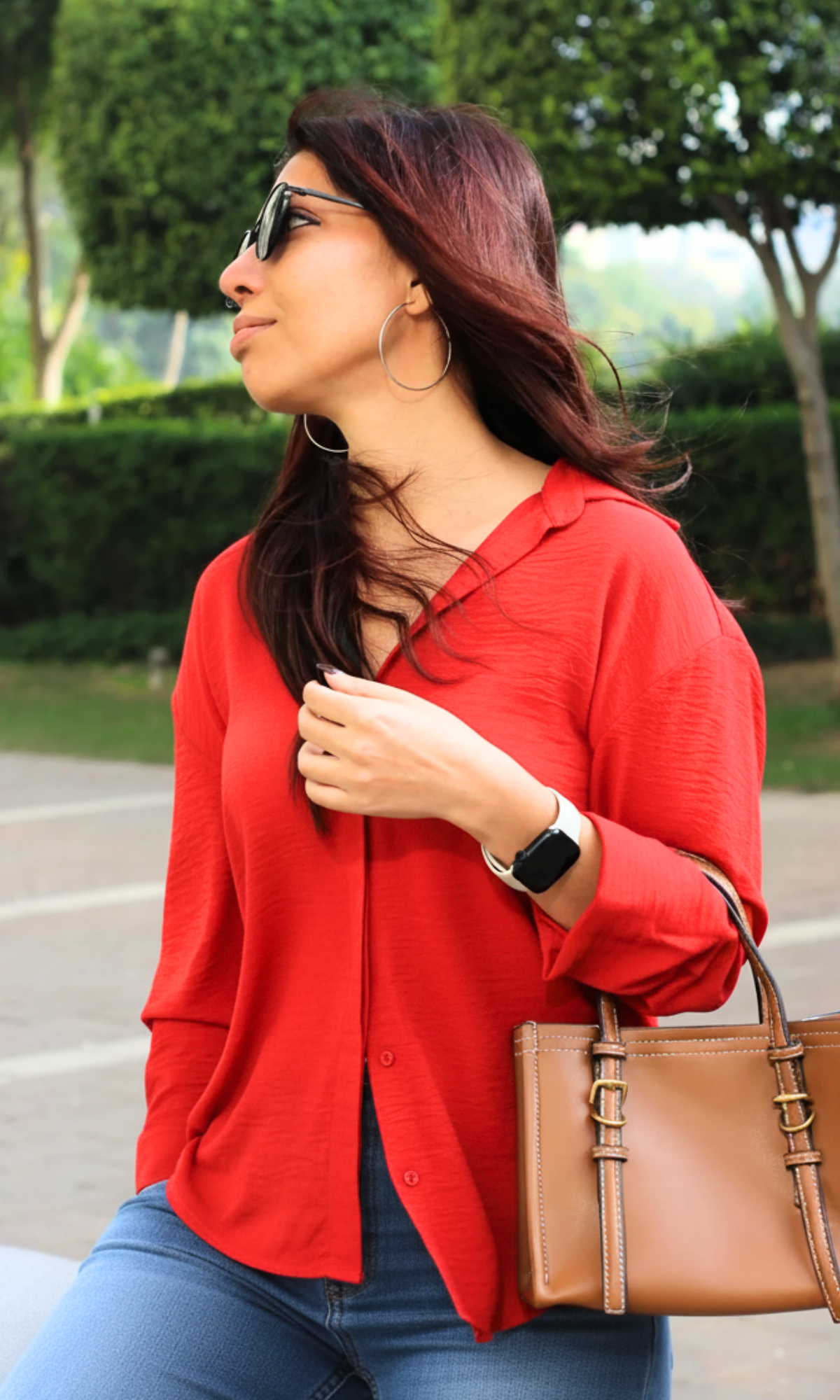 Scarlet flowy blouse-style shirt with loose fit and elegant fall.