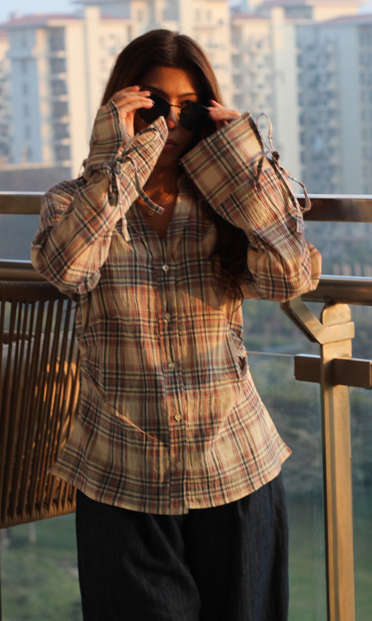 Contemporary women’s blue-blush check cotton shirt styled for casual wear