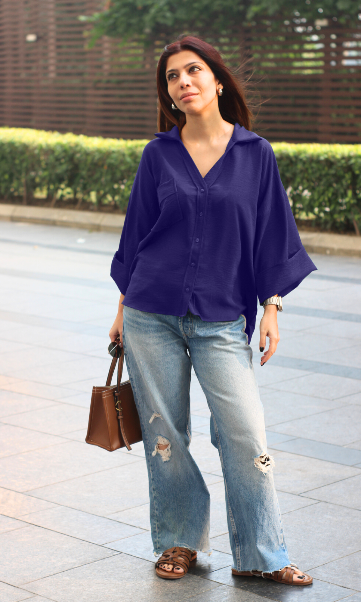 Effortless everyday look with the Violet Flowing Shirt in a breezy, oversized fit styled casually.