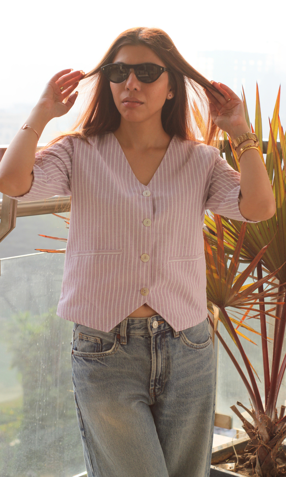 Detailed close-up of brown dobby waist coat with visible weave and buttons