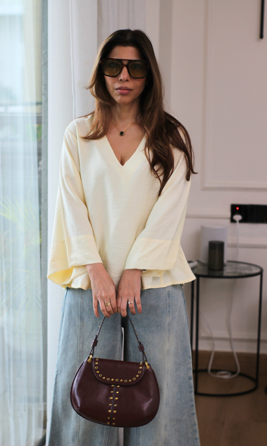 Pale Ice V-Neck Peplum Top