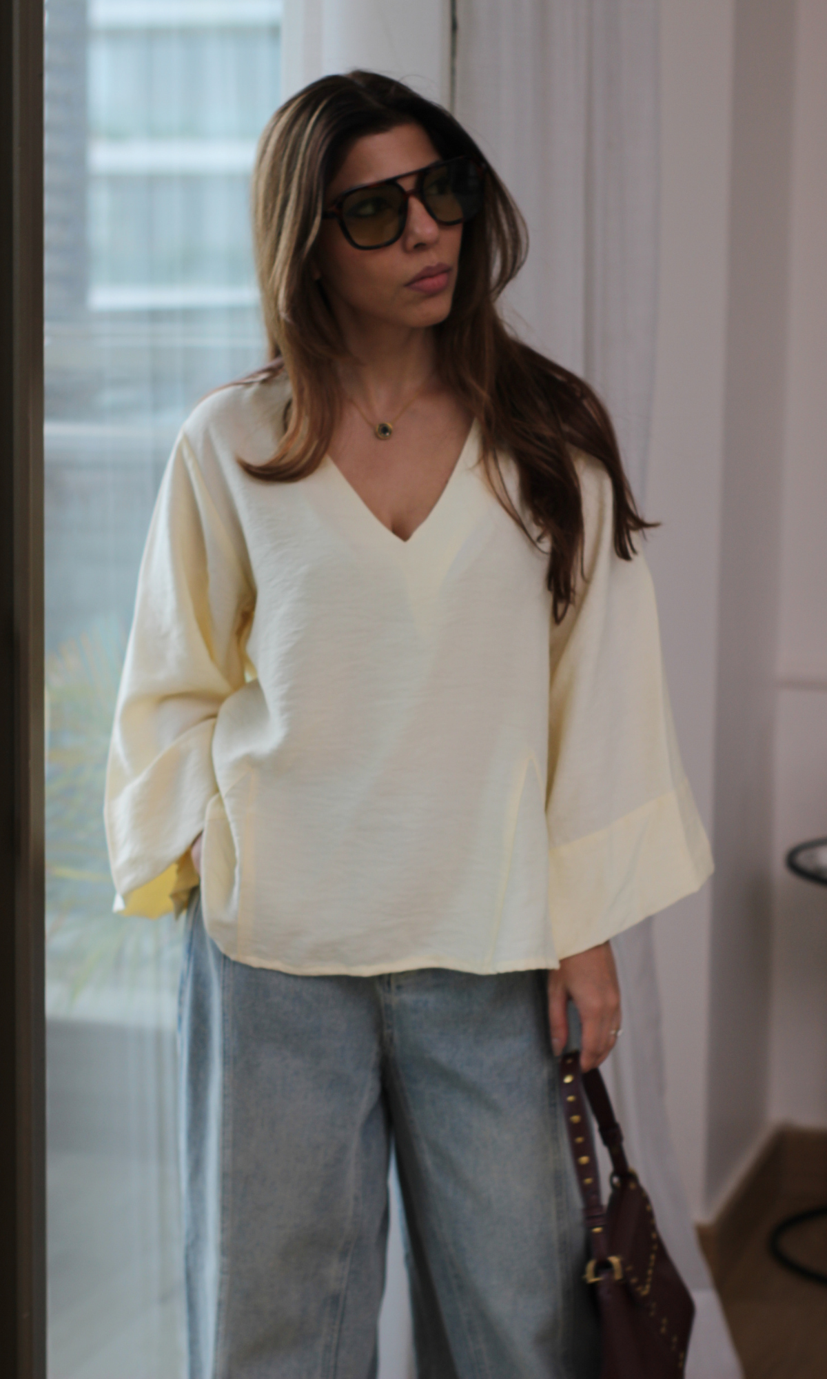 Pale Ice V-Neck Peplum Top