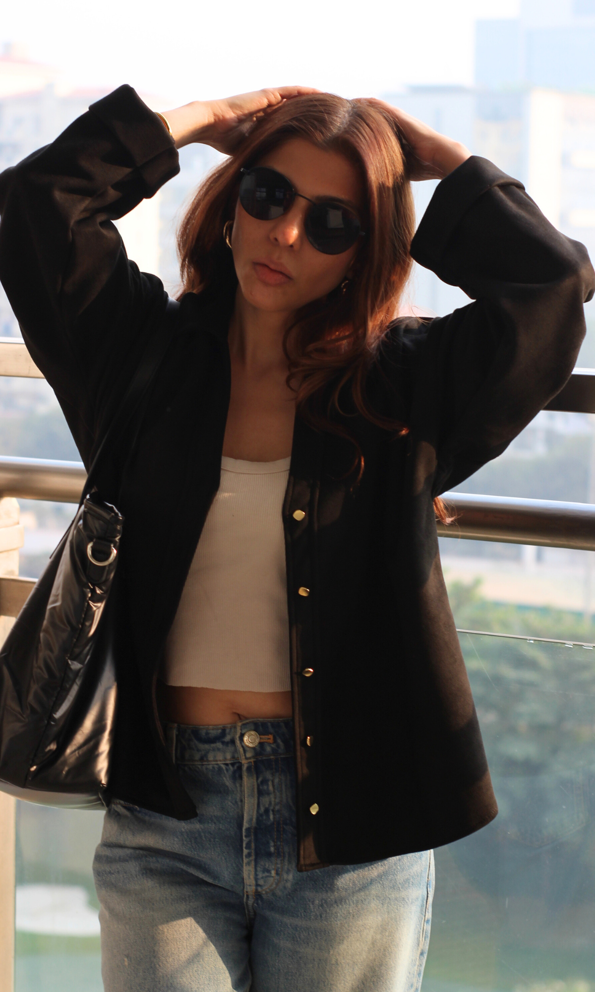 Women’s black metallic-button suede-effect shirt, full-sleeve, classic collar and high-shine detailing for a bold, fashion-forward look.