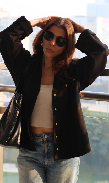 Women’s black metallic-button suede-effect shirt, full-sleeve, classic collar and high-shine detailing for a bold, fashion-forward look.