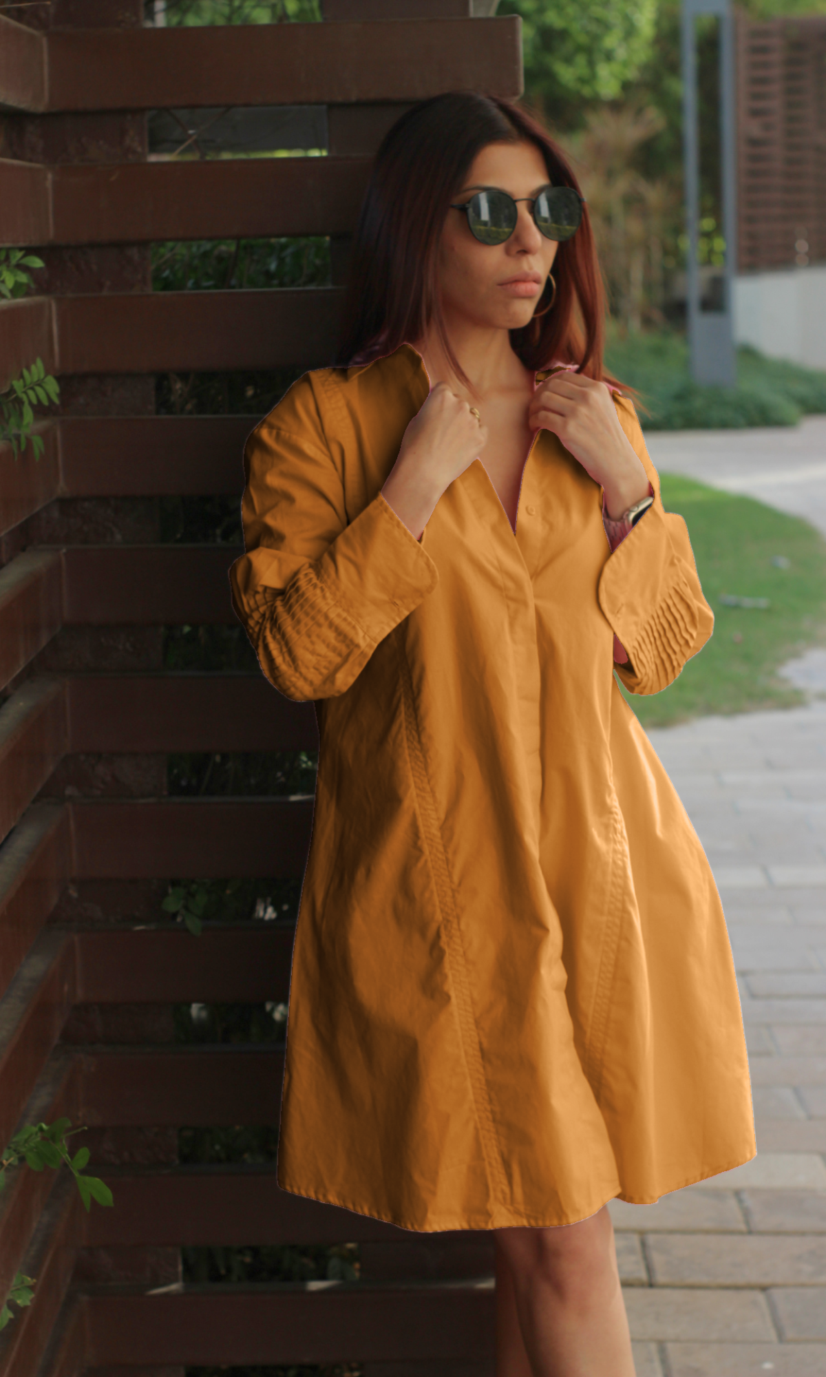 Flowy mustard shirt dress with a structured collar.