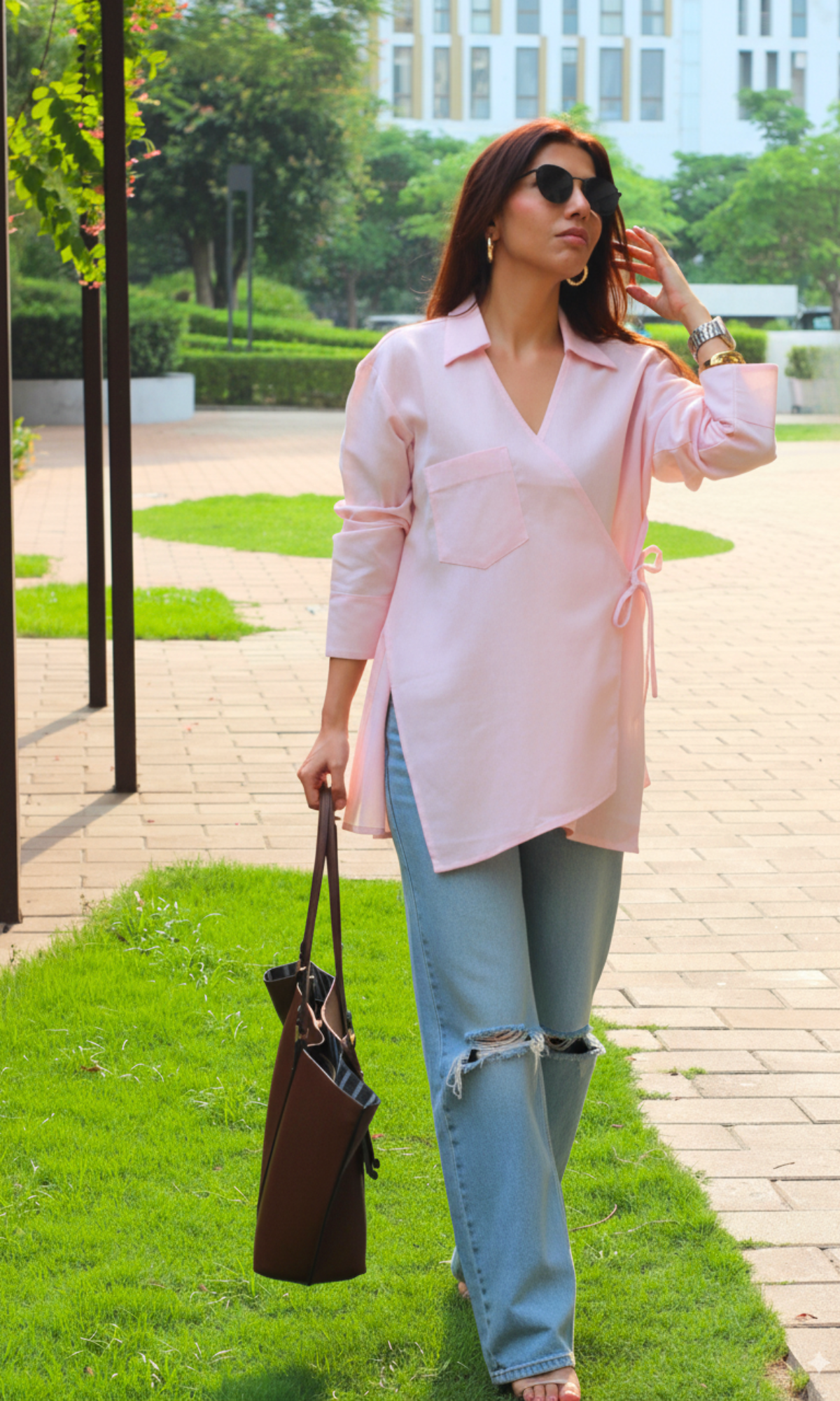 Lightweight blush pink linen kimono top with cut details and a tie-front, perfect for casual and semi-formal wear.
