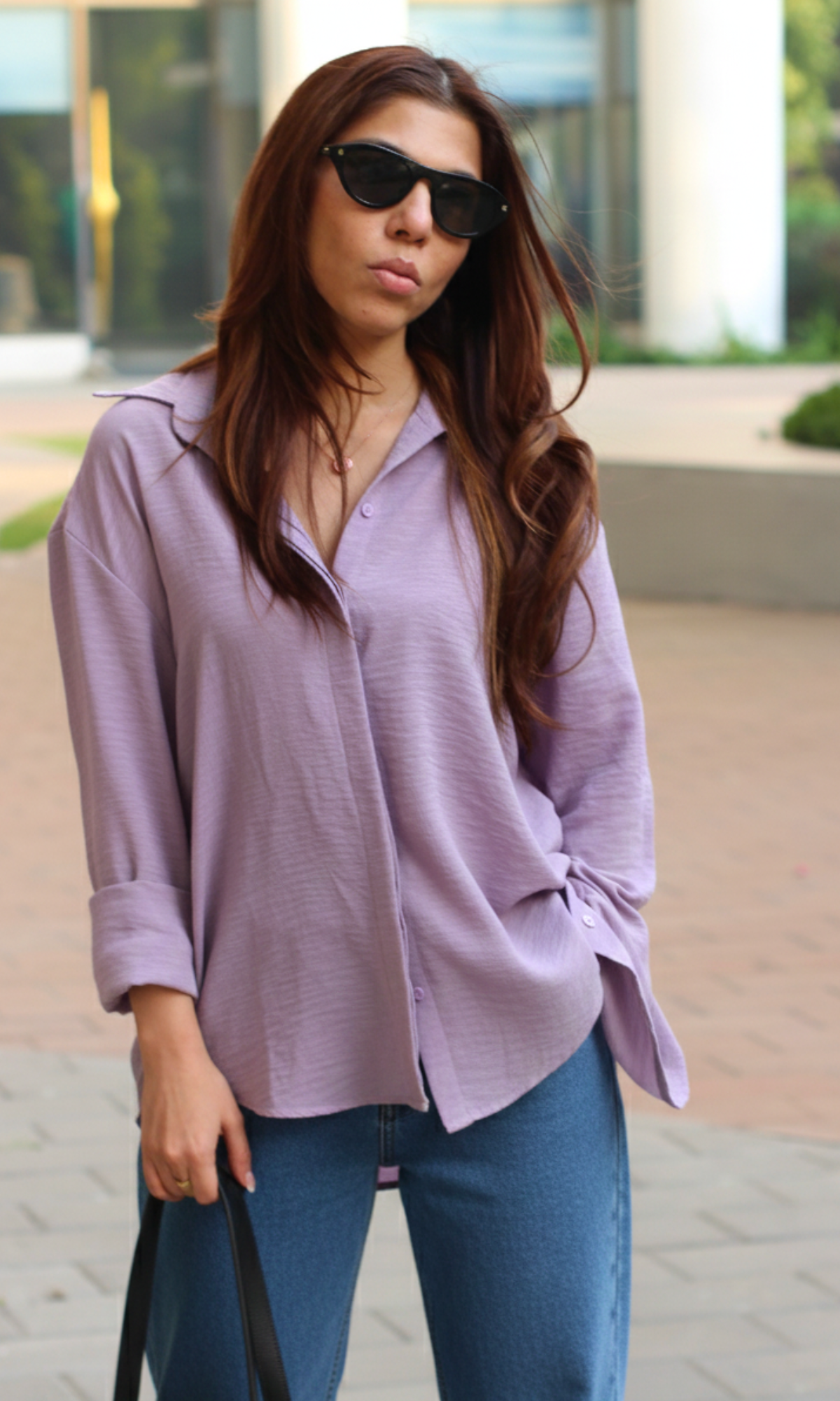 Light lavender flowing shirt featuring breathable fabric and effortless fit