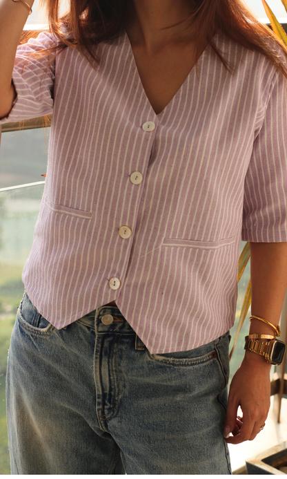 Fabric close-up of brown dobby waistcoat highlighting textured pattern