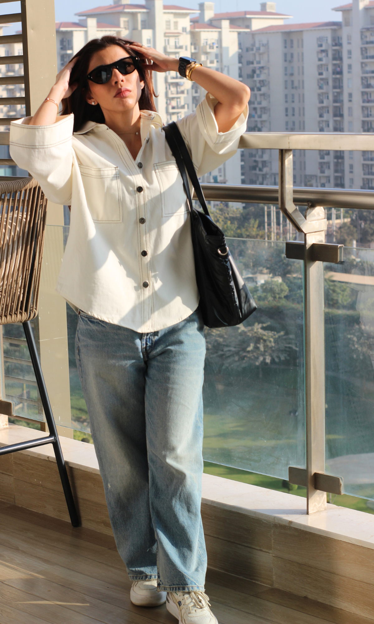 Women’s white thread detail shirt with embroidered stitching and relaxed fit