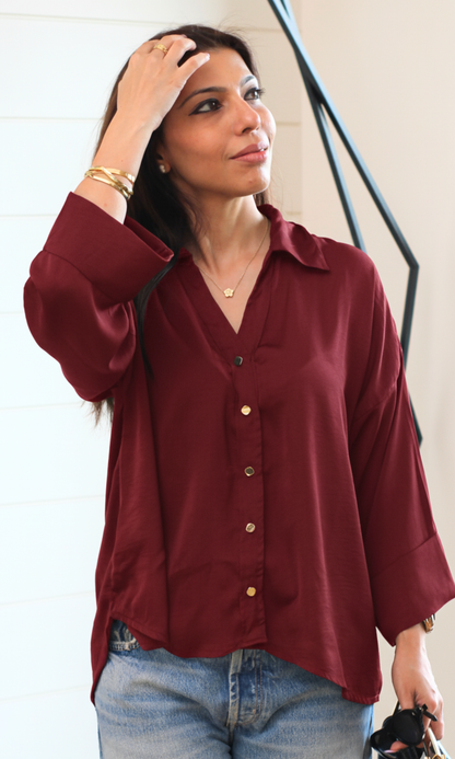 Women’s brown long-sleeve shirt with metallic button details, relaxed straight-fit cotton silhouette — perfect for day-to-night styling.