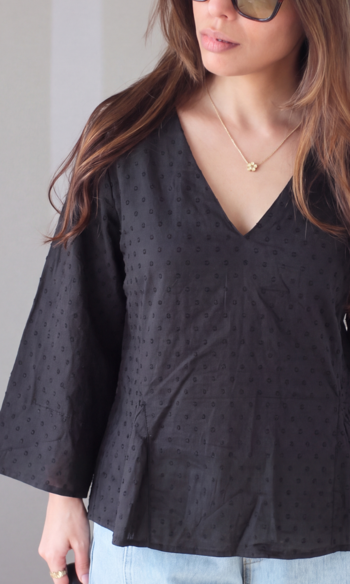 Black Textured V-Neck Peplum Top