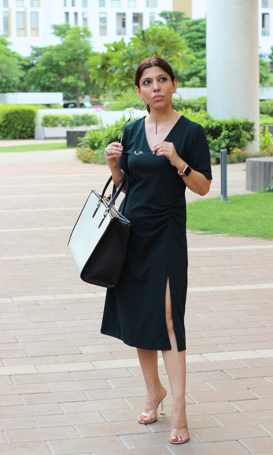 Outdoor look with the Deep Teal Noir Cinched Waist Midi Dress styled minimally with gold hoops and a structured handbag.