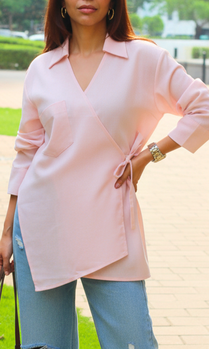 Chic blush pink linen kimono-style top with unique cuts detail, half sleeves, and adjustable waist tie.