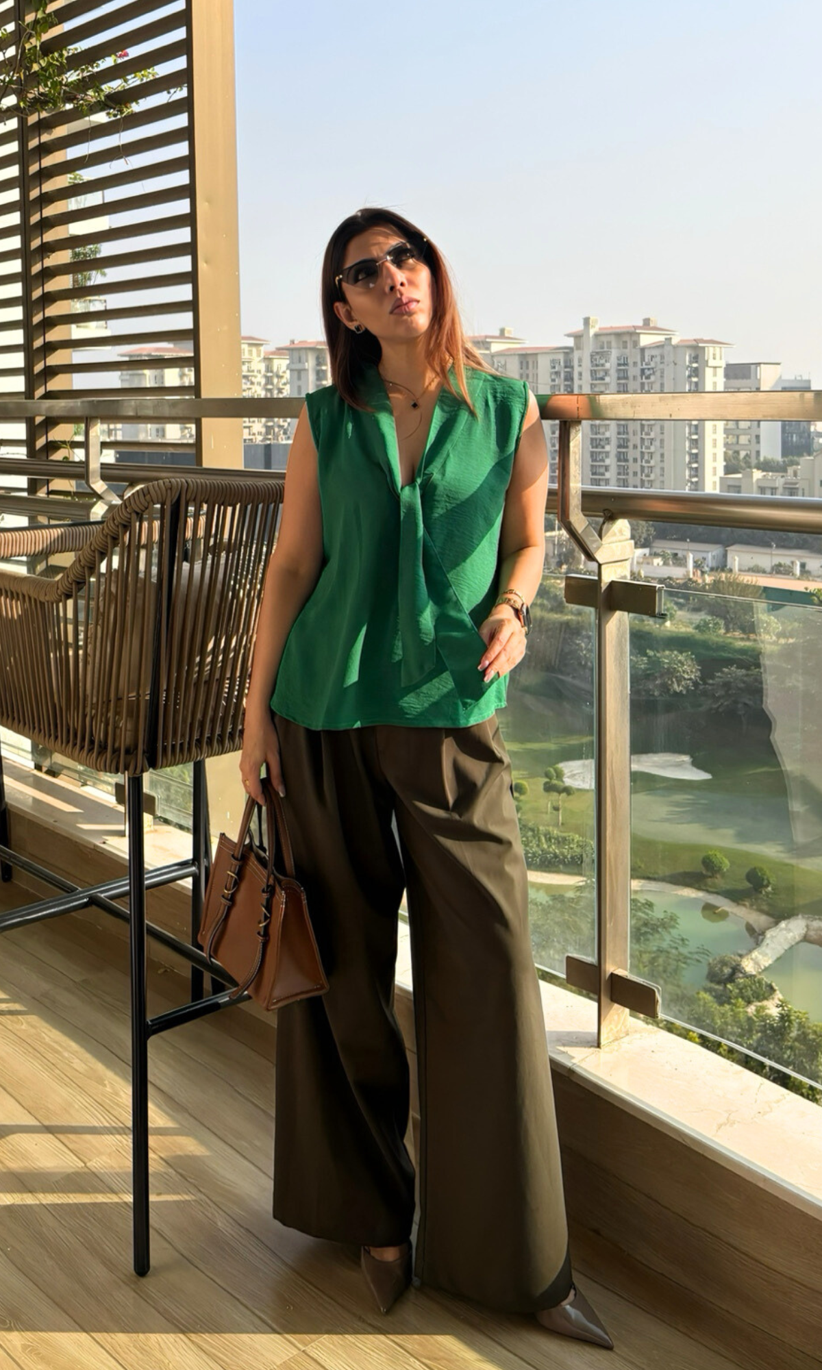 Elegant women’s green tie detail top styled for casual everyday wear