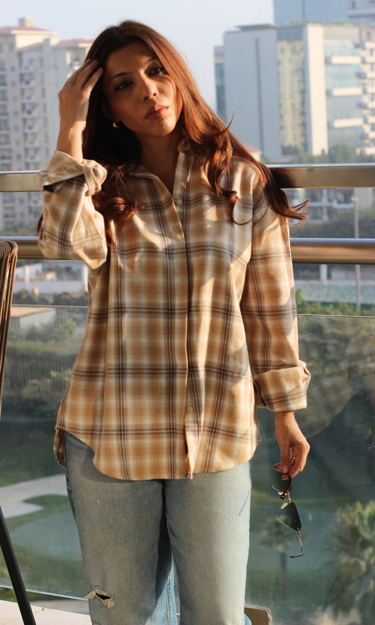 Front view of women’s hazel plaid checked shirt styled for casual wear