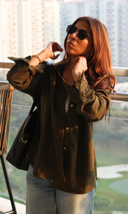 Women’s pickle-green suede shirt with full sleeves and metallic button-front closure — a luxe texture for elevated casual wear.