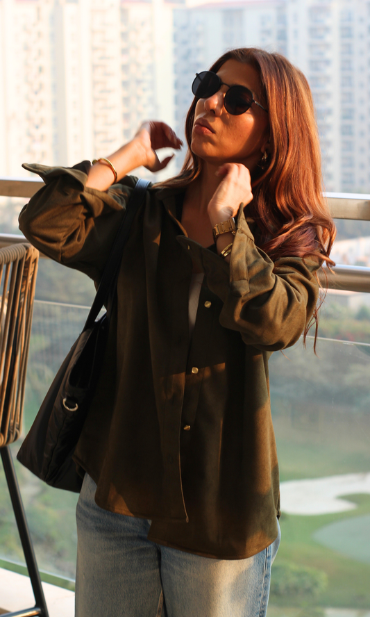 Women’s pickle-green suede shirt with full sleeves and metallic button-front closure — a luxe texture for elevated casual wear.