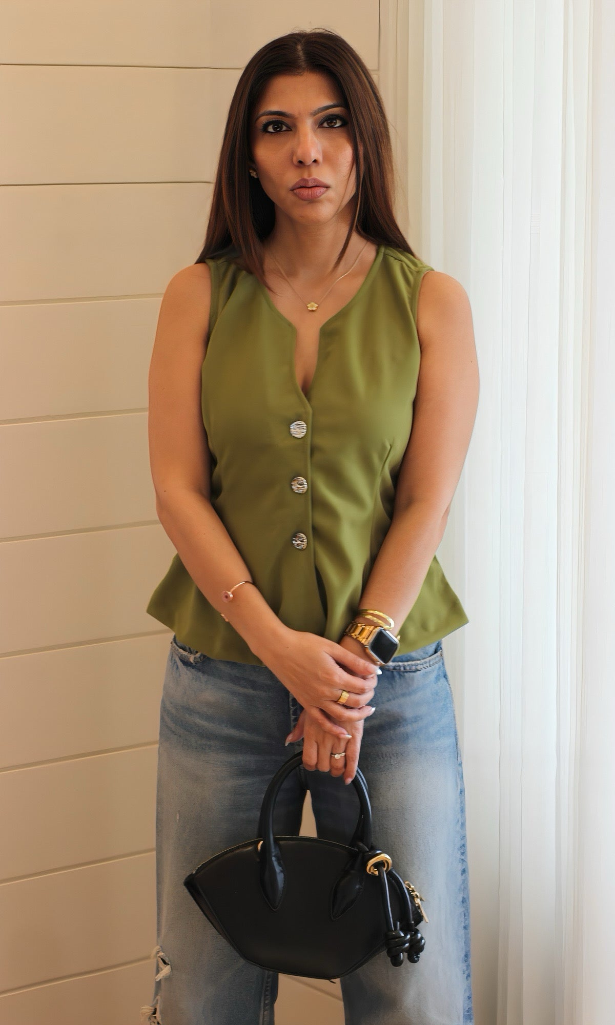 Stylish pear metallic waist coat featuring a sleek sleeveless cut, structured fit, and shiny button detailing for a refined look.