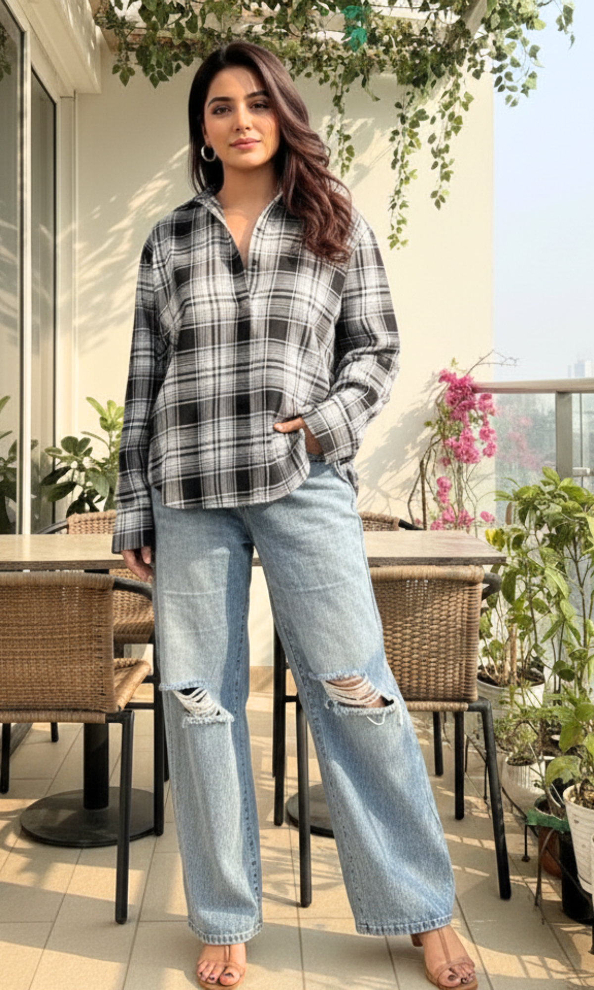 Women's black linen kimono-style top featuring cut detail design