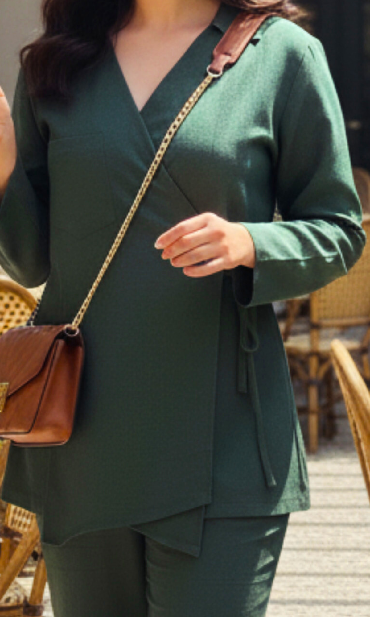 Bottle green linen kimono top with cut-detail design paired with matching wide-leg pants, styled as a coordinated set.