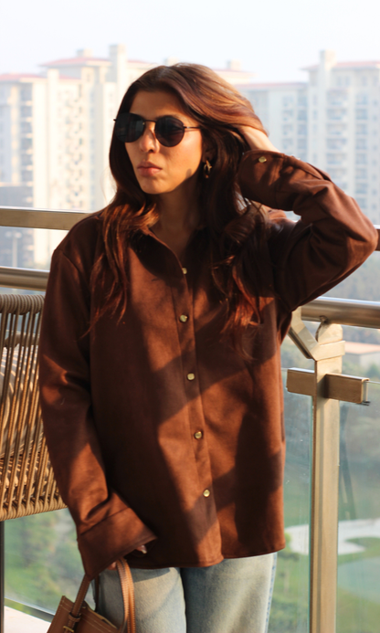 Rich brown suede shirt featuring subtle sheen, full sleeves and metallic button placket — versatile for elevated weekday or evening looks.