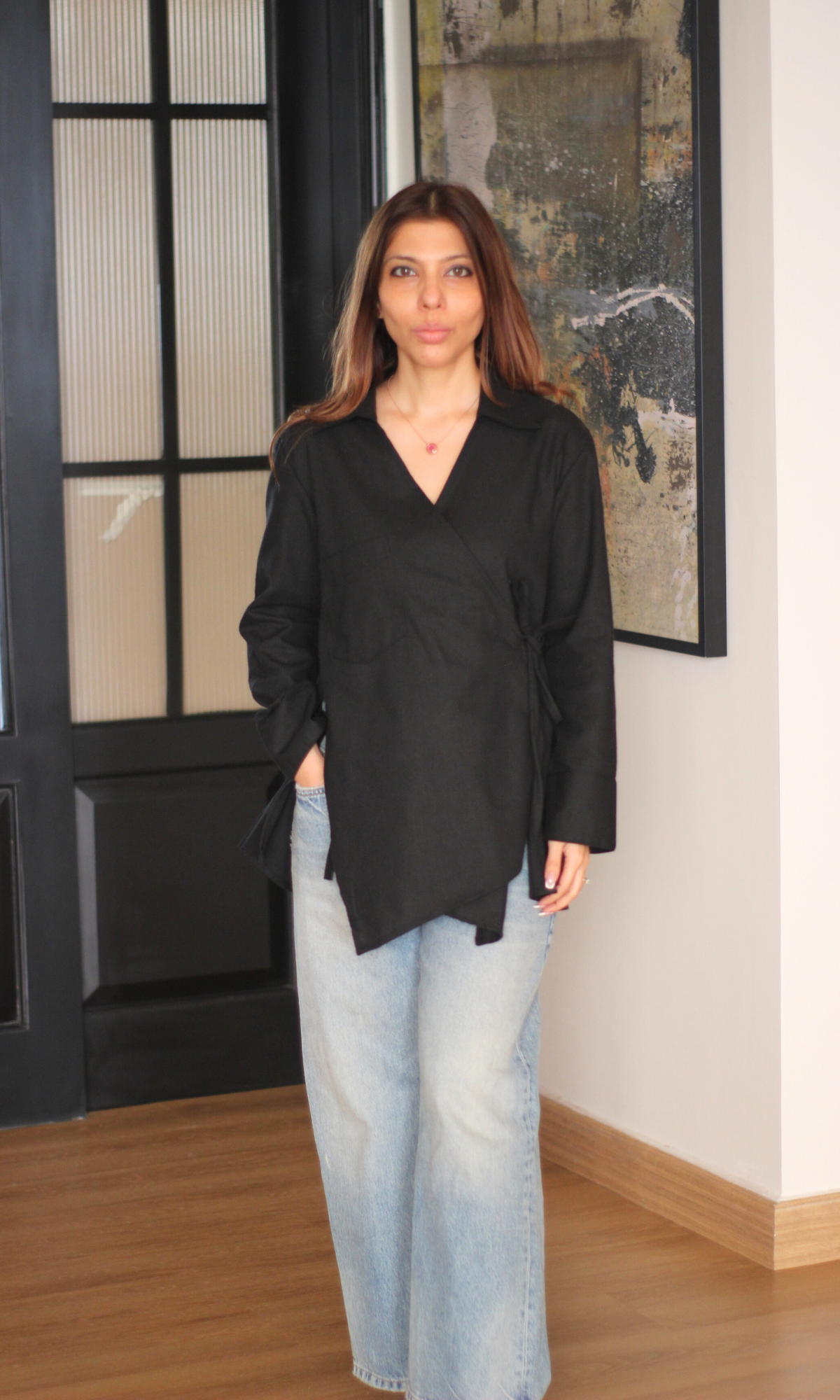 Elegant black linen kimono blouse with artistic cutouts