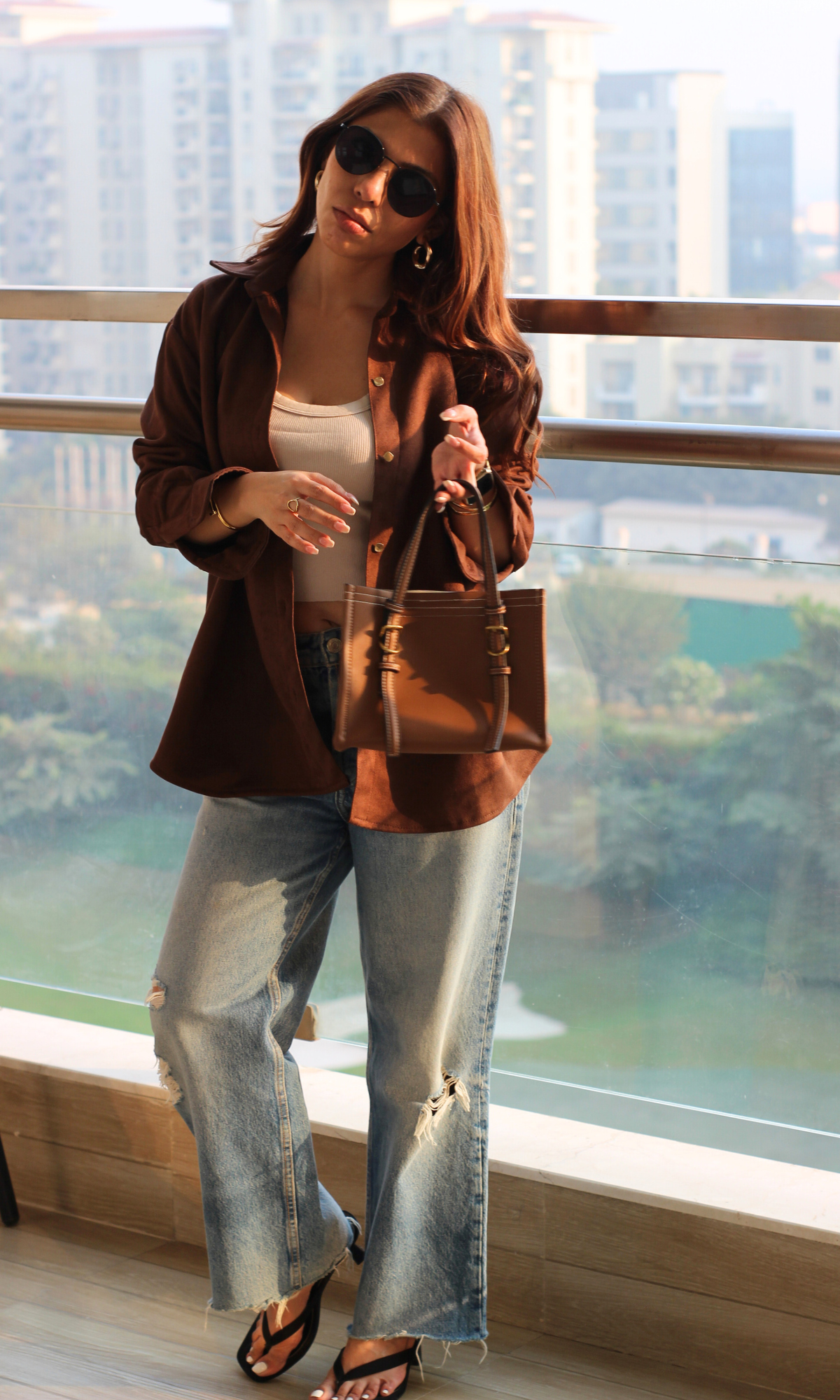 Deep coffee-tone suede shirt with metallic buttons for women, long sleeves and soft drape — ideal for smart-casual styling.